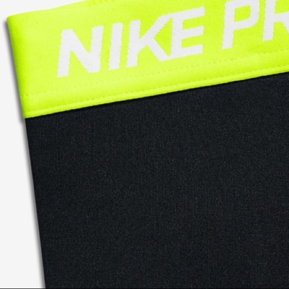 NWOT Black and Neon Yellow Nike Pros
